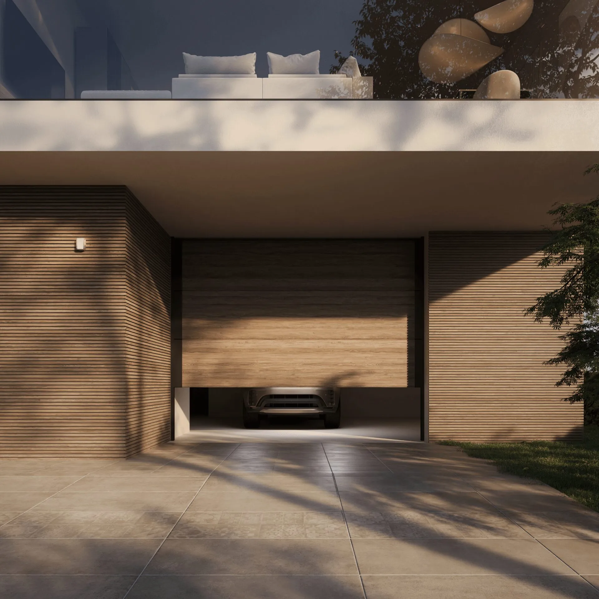 Porta da garage sezionale automatizzata sotto una casa contemporanea