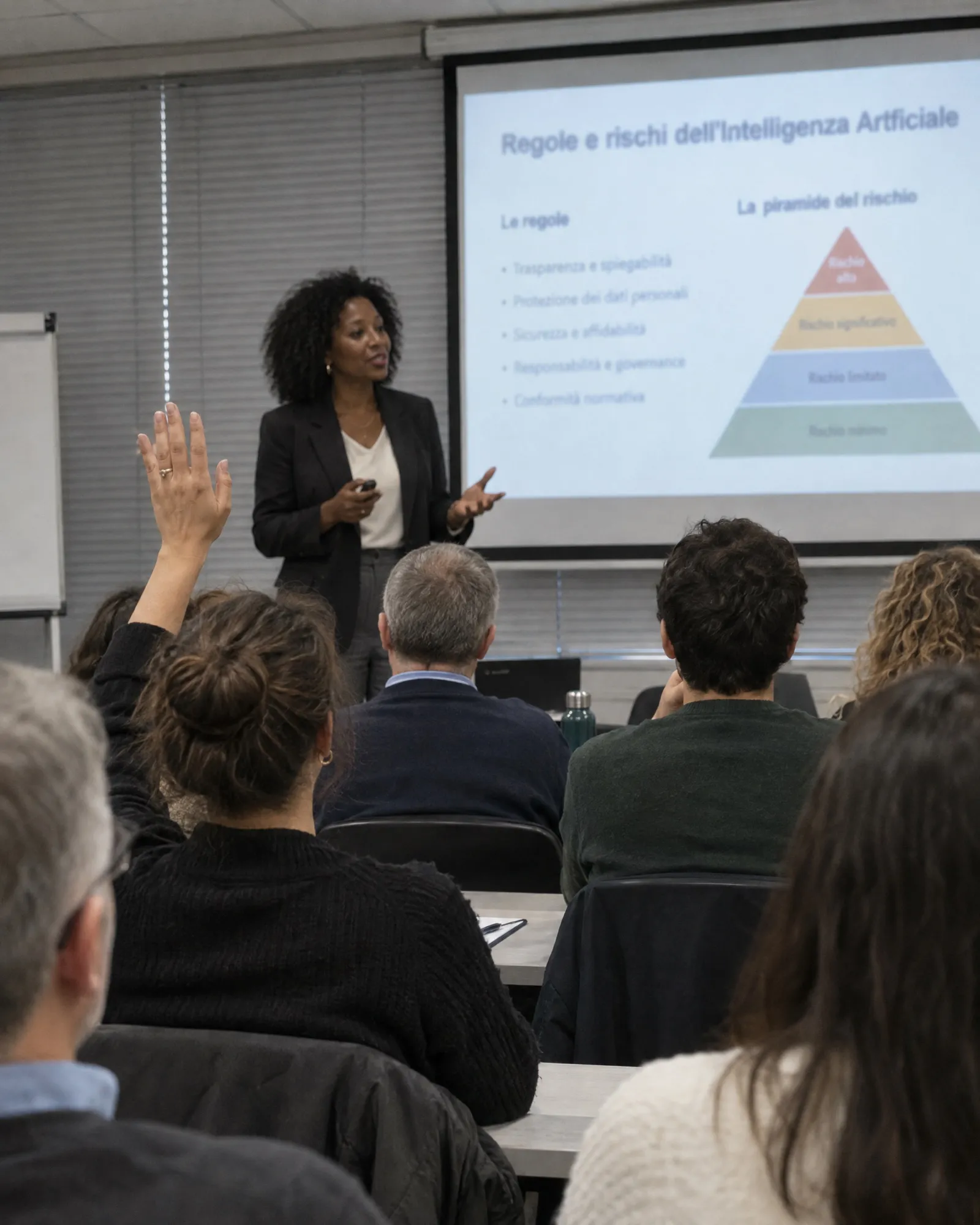 Aula in azienda, slide su regole e rischi dell'AI Act