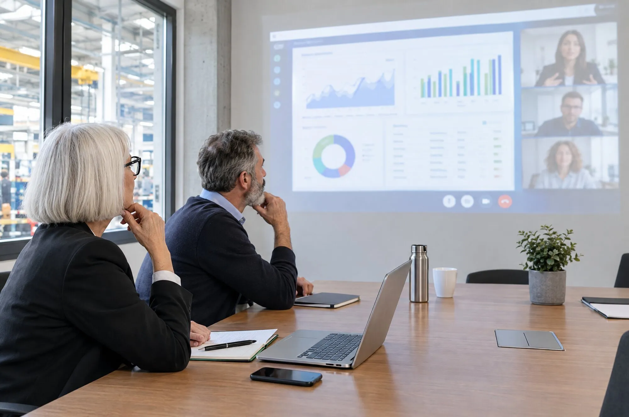 Report mensile in Looker Studio proiettato durante una call